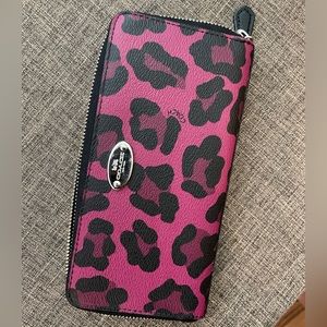 Authentic Coach Zippered Wallet. Pink/Purple leopard print.